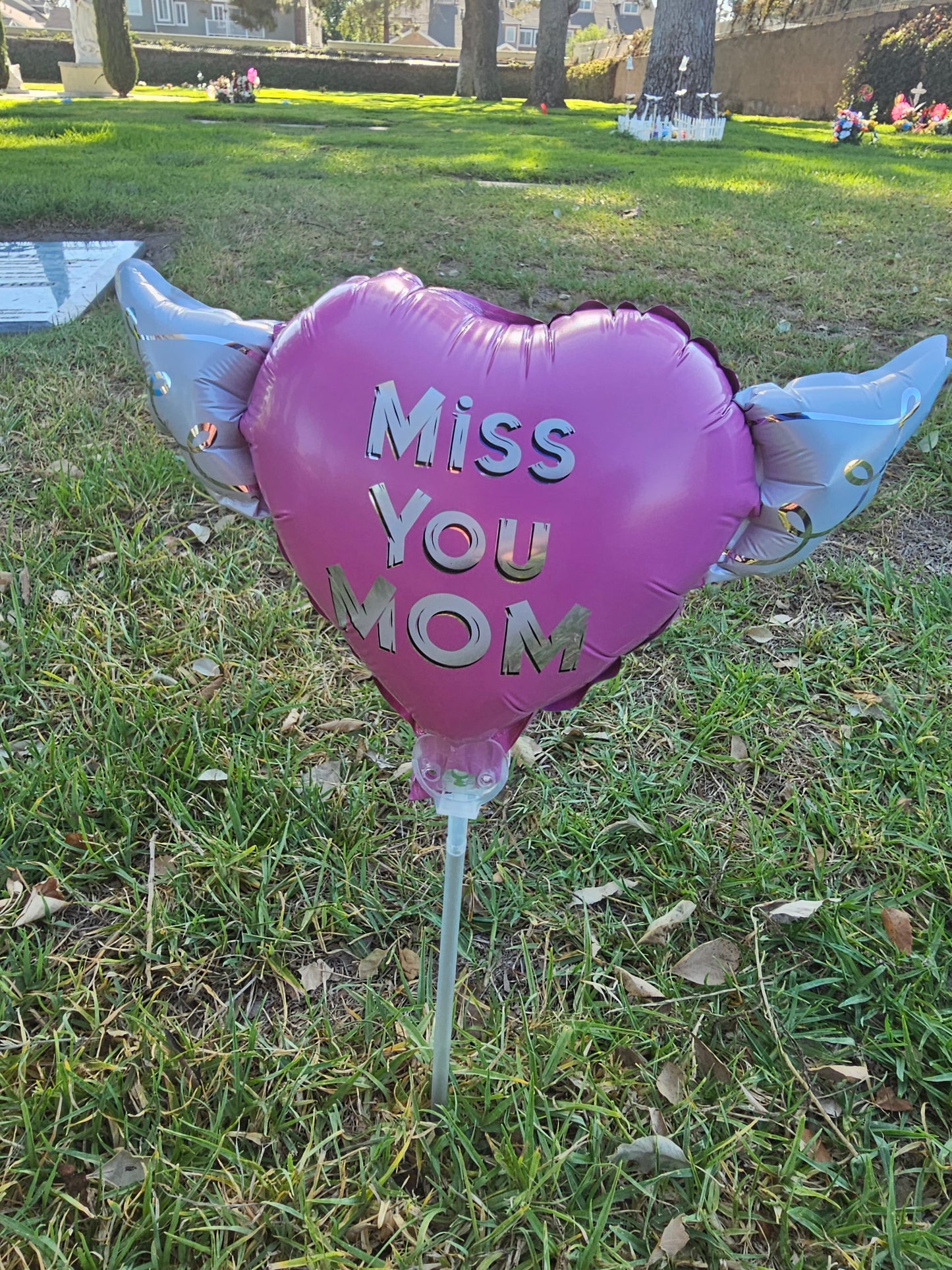 Heavenly Balloons ® on a Stick Miss You Mom (pink) balloon heart-shaped with angel wings