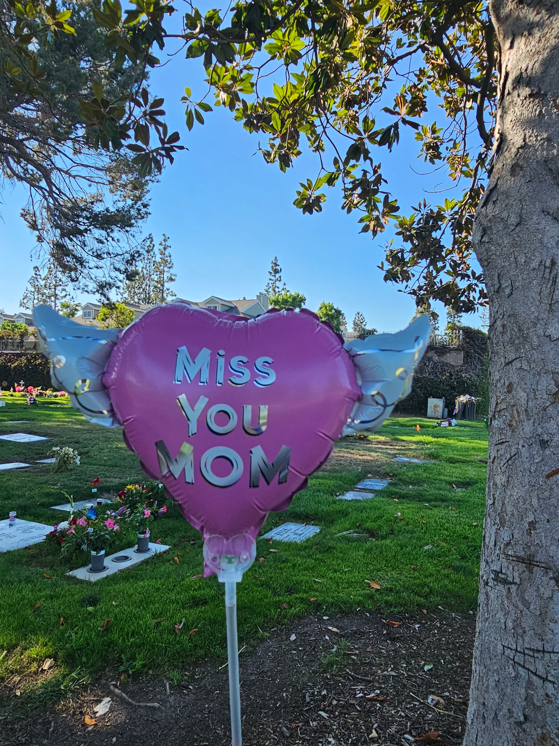 Heavenly Balloons ® on a Stick Miss You Mom (pink) balloon heart-shaped with angel wings