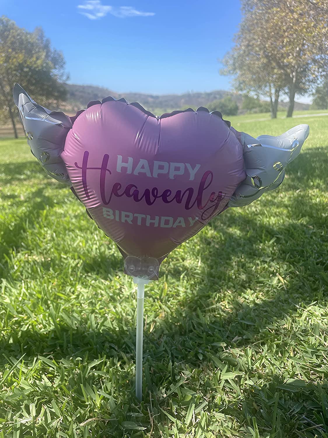 Happy Heavenly Birthday pink/purple balloons on a stick heart shaped with angel wings